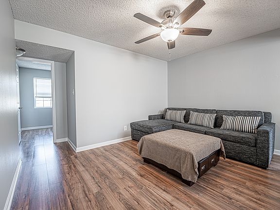 Living room area - furniture available for purchase.