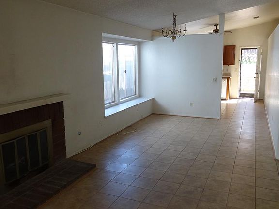 Family Room with Tile Floors and Fireplace