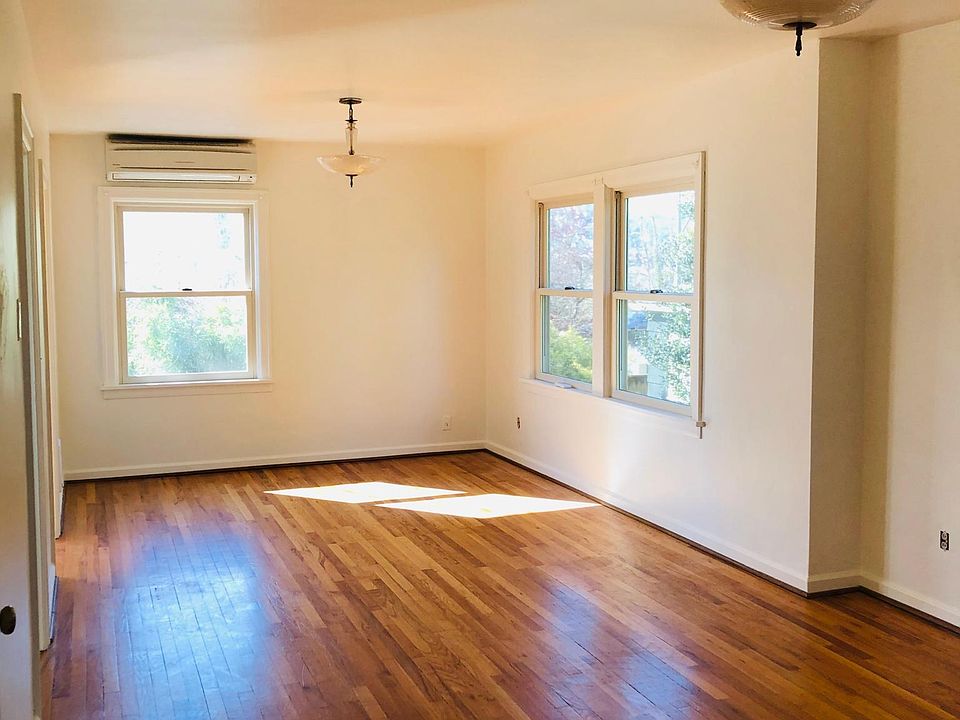 Large living room/dining room space.