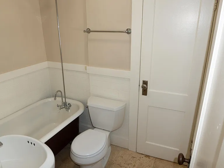 The main bathroom entered here from the front bedroom.