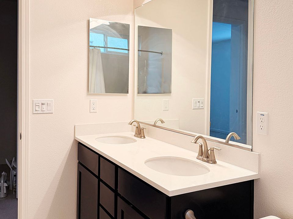 Share with only one other person, featuring a double-sink vanity where you have your own private sink and storage.