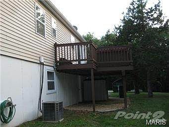 Nice deck on nicely sided, well kept exterior of this home.