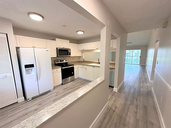 2nd image of 5684 Woodmere Lake Cir Unit 203