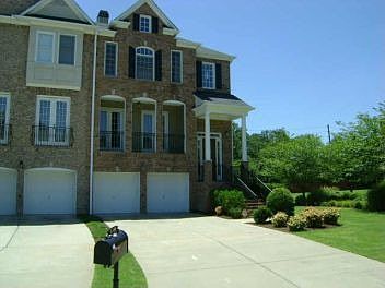 Driveway holds minimum 6 cars; 2 front french doors off the living room
