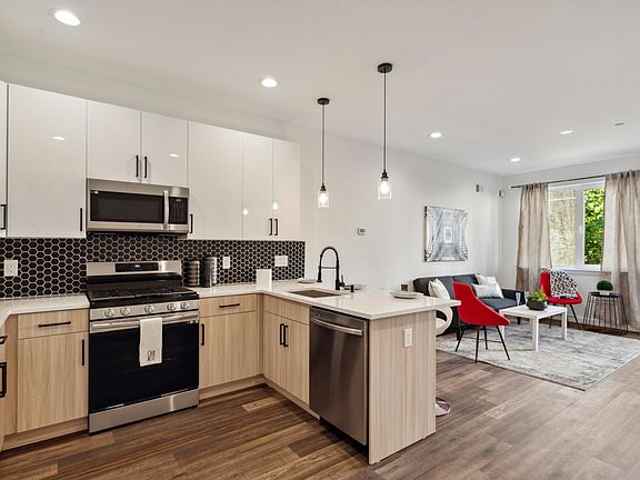 Designer kitchen equipped with stainless steel appliances