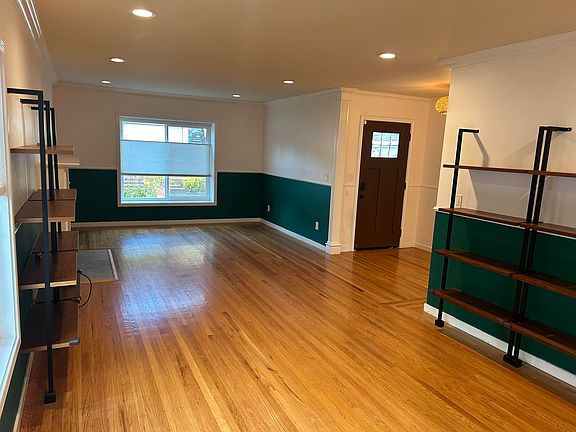 Living room, built in bookshelves included