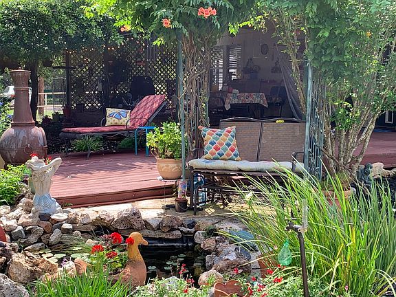 Koi pond off covered back de