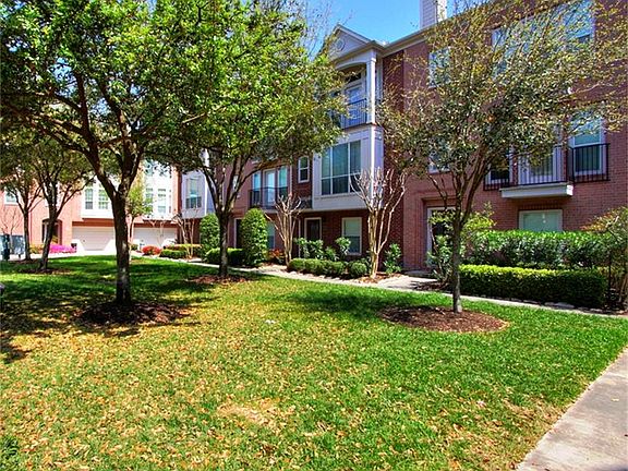 Quiet gated community with guest parking and a large green space for everyone's enjoyment.