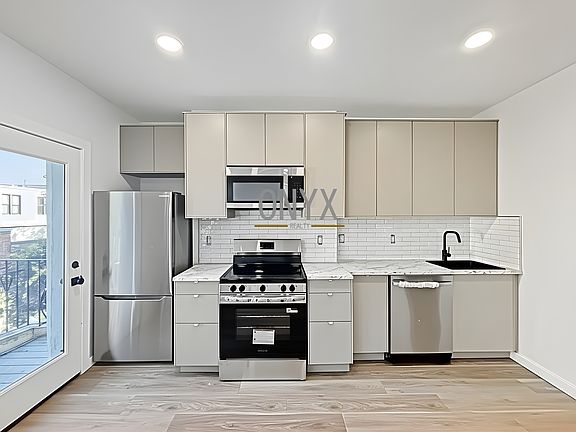 3rd image of 20-15 Menahan St #1