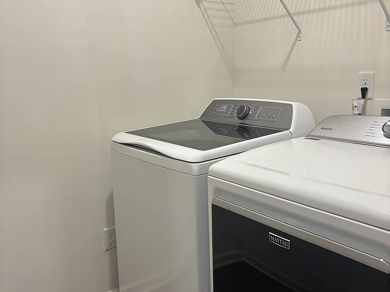 Laundry Room has full-size Washer & Dryer