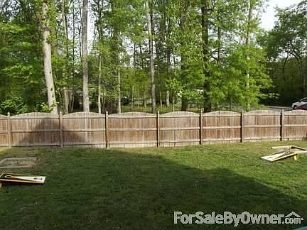 rear
						:
						property backs open wooded open space for the community. Covered back deck