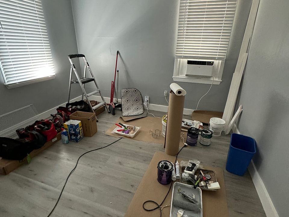 Living space (picture during rennovation so lighting / finishes / furniture weren't fully installed at the time). Bed and armoire are currently in place.