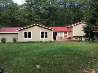 1697 Rogers Rd, Grawn, MI 49637