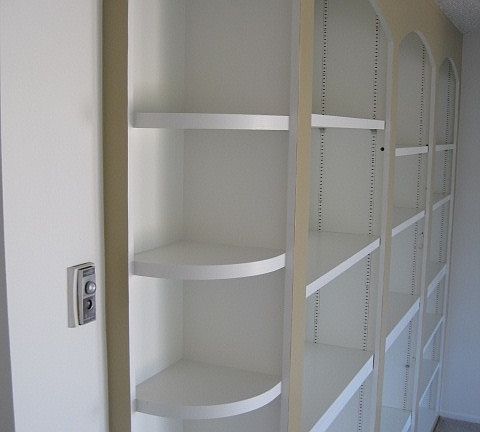Built in wall shelving in living room