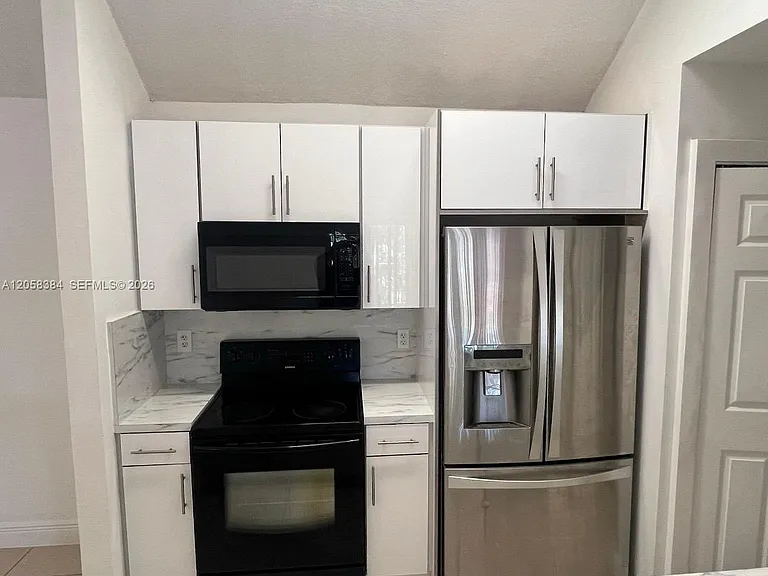 15771 SW 106th Ter #302 — Photo 2