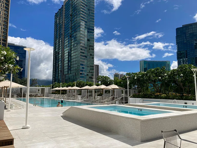 Large pool area with 2 jacuzzis. Outdoor lounge areas and bbq cabanas.