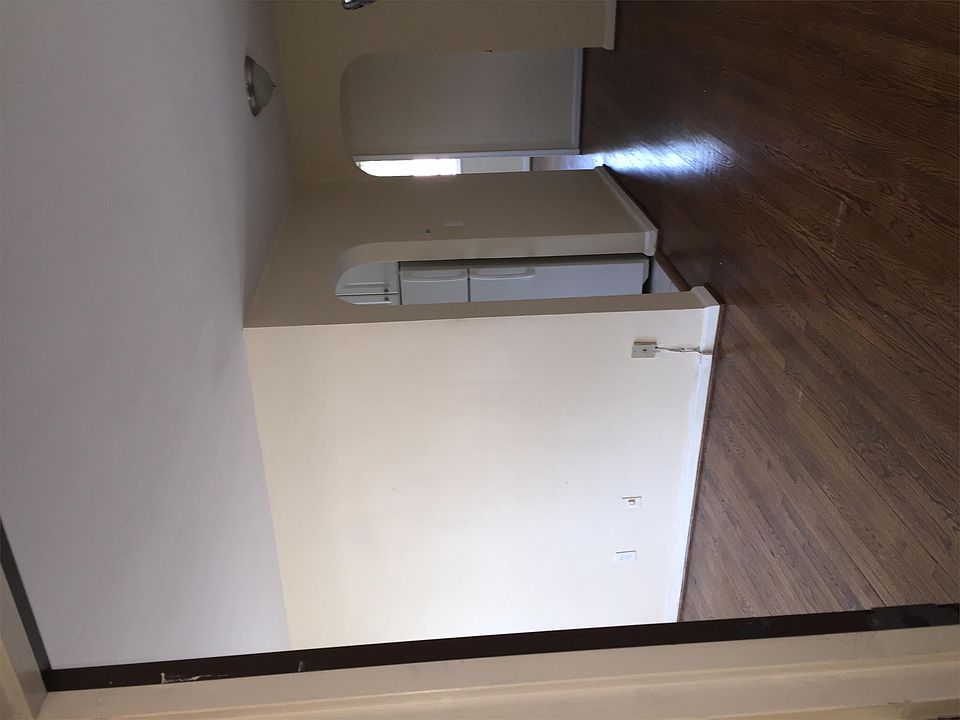 Standing in front door