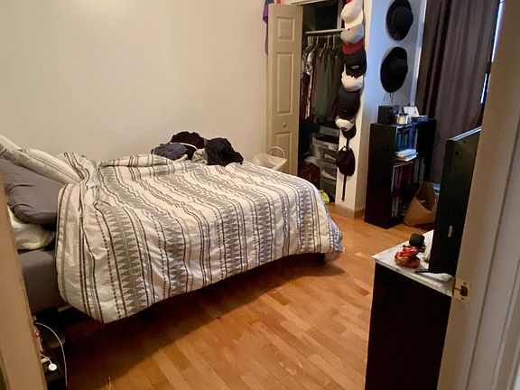 Bedroom with hardwood floors throughout