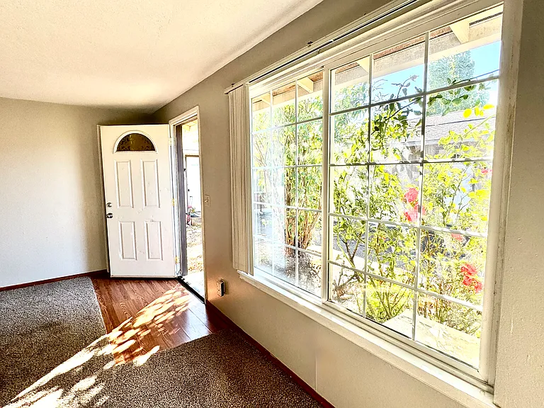 Lots of natural lighting through the updated vinyl windows
