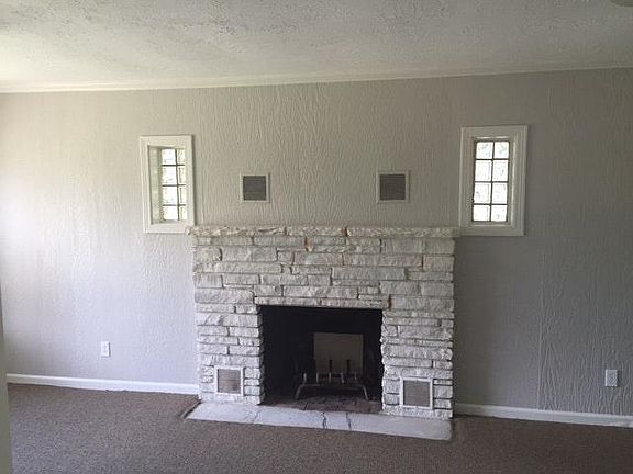 Den/Fourth Bedroom Fireplace