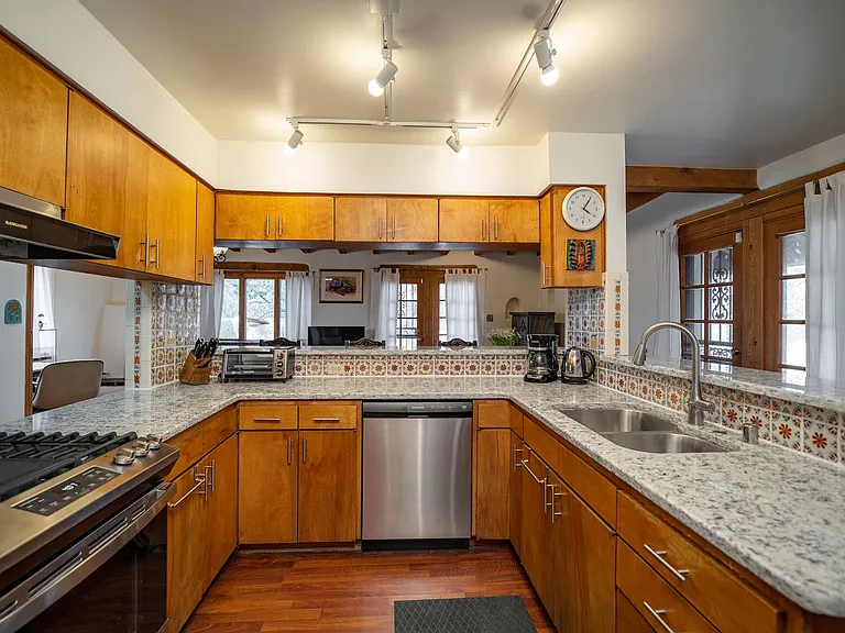 Kitchen with family room in rear, front courtyard to the right