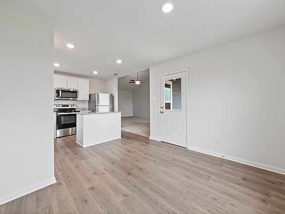 The private dining room of the Sabine sits adjacent to the kitchen.