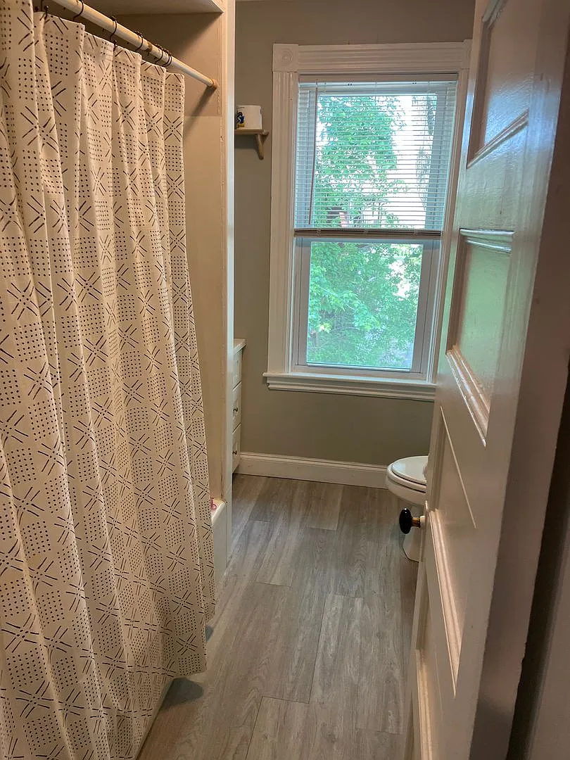 Huge 4 bed 3 bath Bi level unit near the Red Line and Commuter Rail in Quincy! — Photo 1