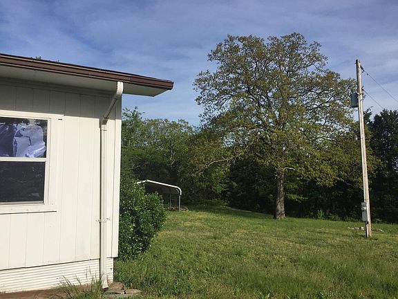 Backyard view with open shed space