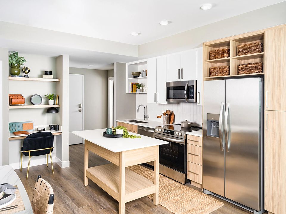 An open kitchen at Modera McGavock, featuring upscale finishes and flexible space, with quick access to Nashville's dining, music, and everyday essentials.