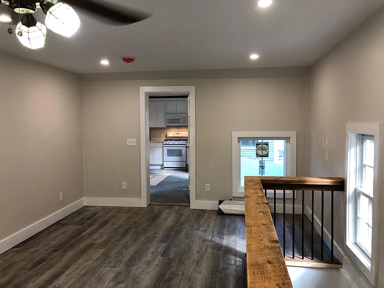 Space for dining table. Door leads to kitchen.