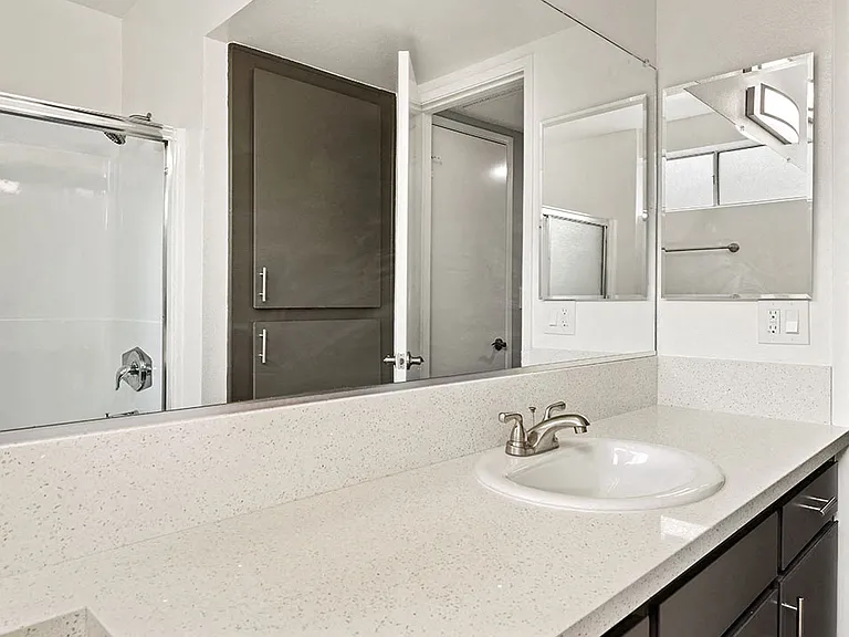 Modern styled bathroom with shower and tub.