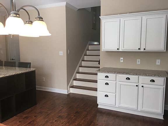 Partial view of kitchen from breakfast area