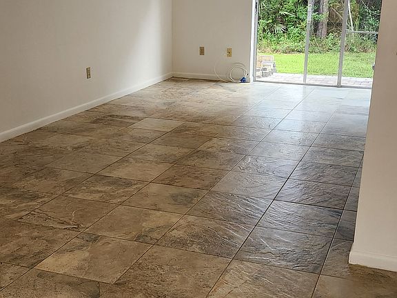 Living room looking into patio