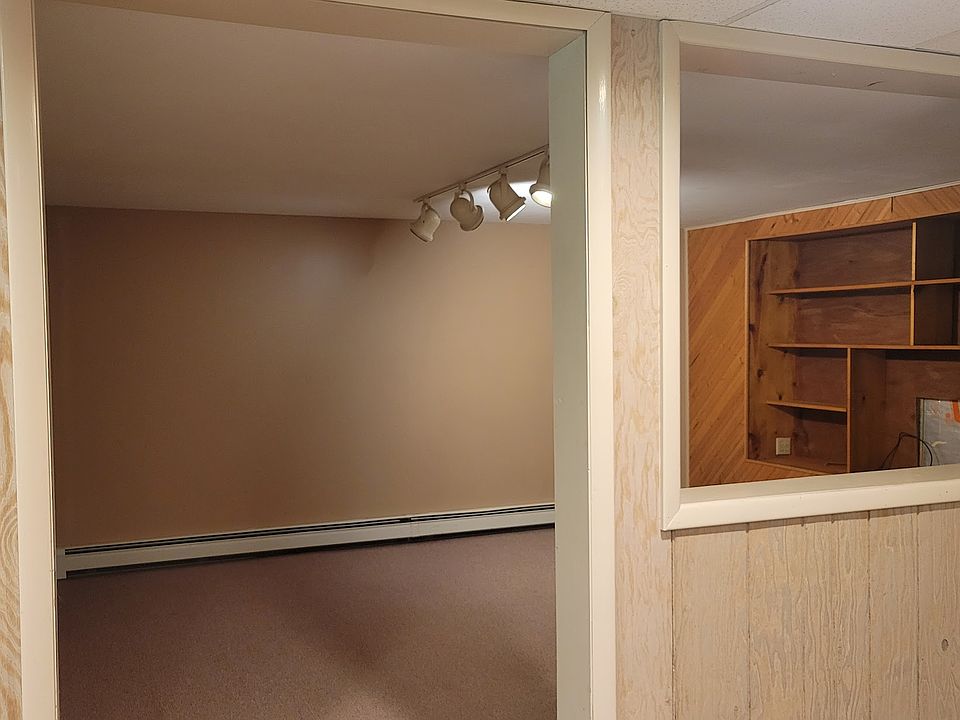 TV room with built in shelves