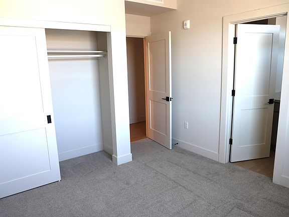 Primary Bedroom with ensuite bathroom and large closet.