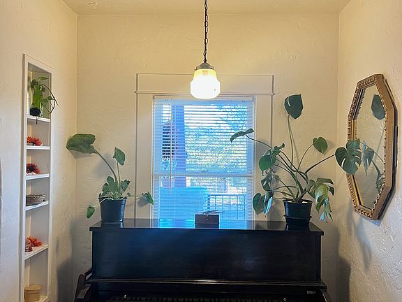 Breakfast nook can have small dining table, desk, or piano...