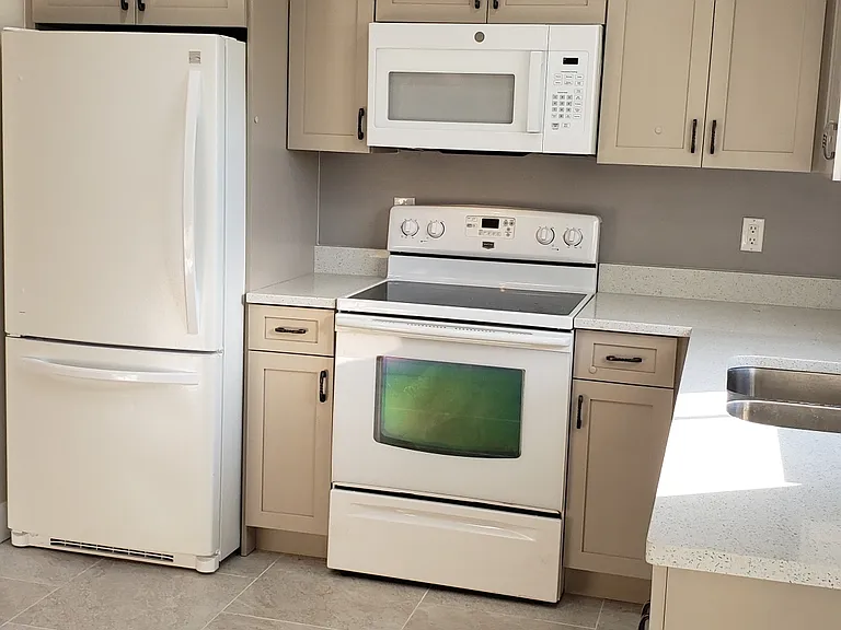 New Kitchen wood Cabinets, Micro and other appliances.