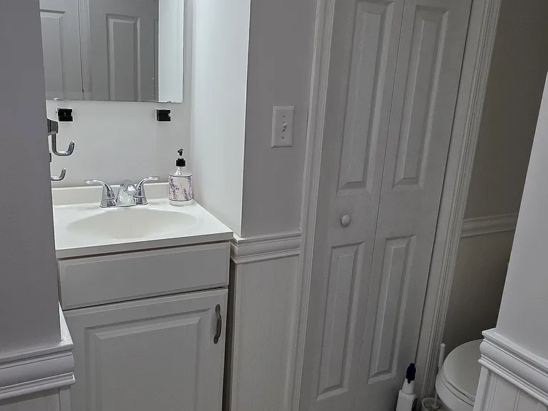 Full bath and laundry in Basement