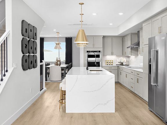 Welcoming kitchen with waterfall edge island