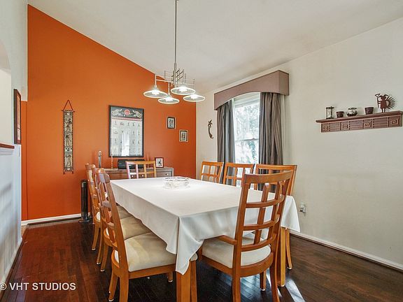 Great pass through window from the kitchen into the Dining room makes serving so easy. Dining room is open to the living room so you can expand your table.