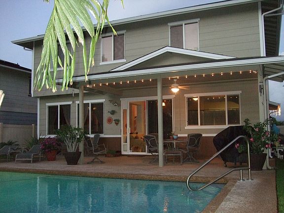 Solar Heated Saline Tile Pool w Covered Lanai and FuturaStone Surround