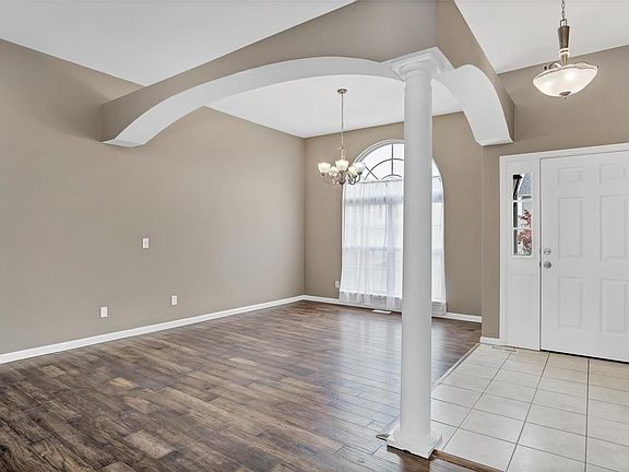 View of front entry foyer & formal dining room. Could be used as an office / study area as well.