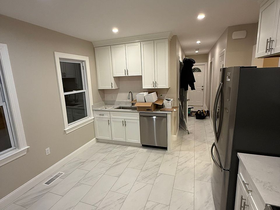 Eat in kitchen with quartz countertop and pantry