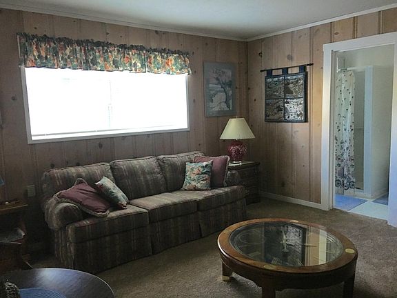 Living room with bath off to side.
