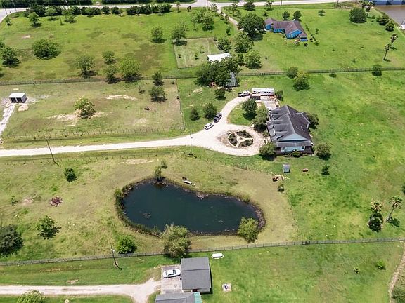 Coastal country living at its finest awaits you with over 300 ft of waterfront along the Diversionary Canal. Minutes boat ride t