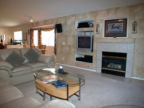 Family room with gas fireplace and built-in entertainment center