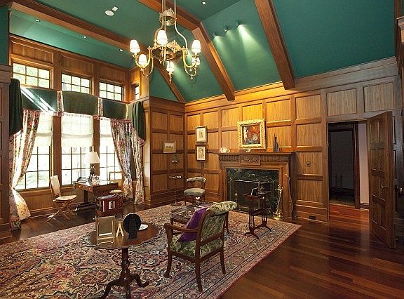 Soaring ceilings and wood panel walls