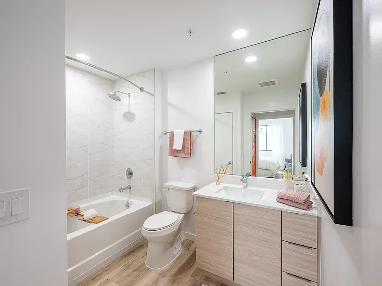 Bathrooms are complete with luxury soaking tubs.