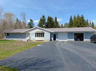 W16104 Simmons Woods Rd, Gould City, MI 49838