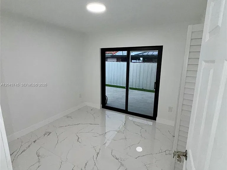 8945 NW 114th St — Photo 11